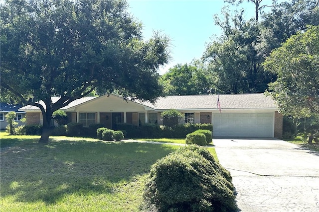 ranch-style house with a front lawn and a garage