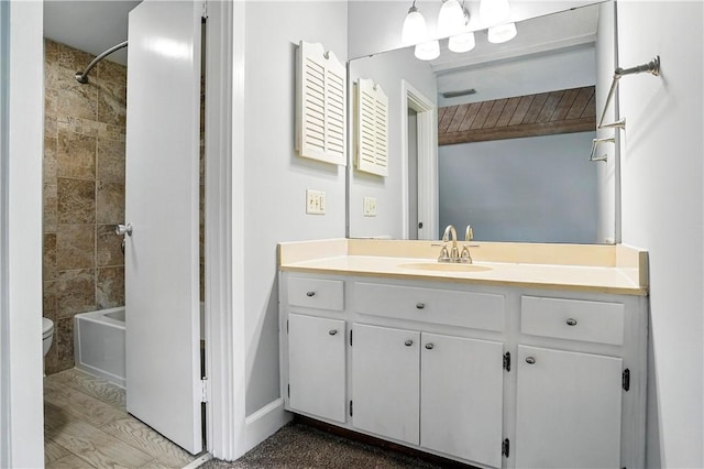422 Fairway Villas Dr, Saint Simons Island, GA 31522 - bathroom featuring vanity and washtub / shower combination