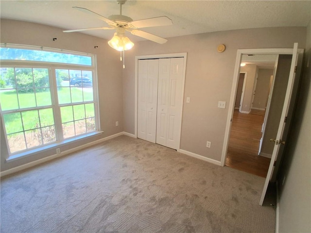 43 Shadowlake Ct, Brunswick, GA 31525 - unfurnished bedroom with carpet flooring, a closet, and ceiling fan