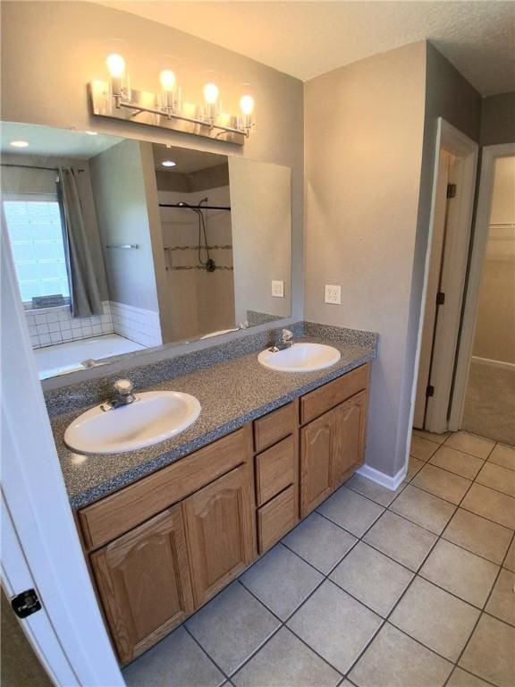 43 Shadowlake Ct, Brunswick, GA 31525 - bathroom featuring tile patterned flooring, double vanity, a shower, and a tub