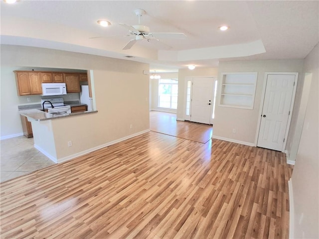 43 Shadowlake Ct, Brunswick, GA 31525 - unfurnished living room with a ceiling fan, light wood-style floors, and recessed lighting