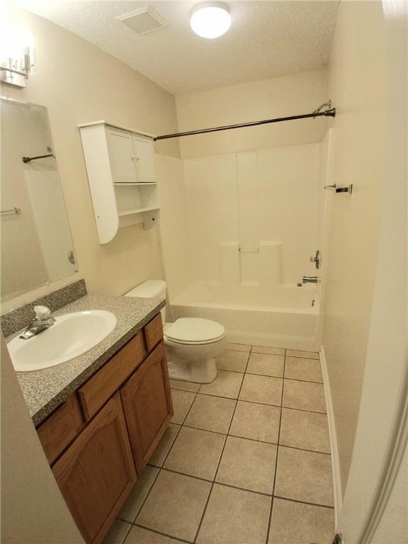 43 Shadowlake Ct, Brunswick, GA 31525 - bathroom with vanity, tile patterned flooring, and tub / shower combination