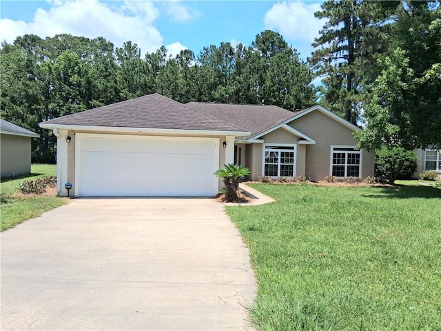 43 Shadowlake Ct, Brunswick, GA 31525 - single story home with driveway, stucco siding, a garage, a front lawn, and roof with shingles
