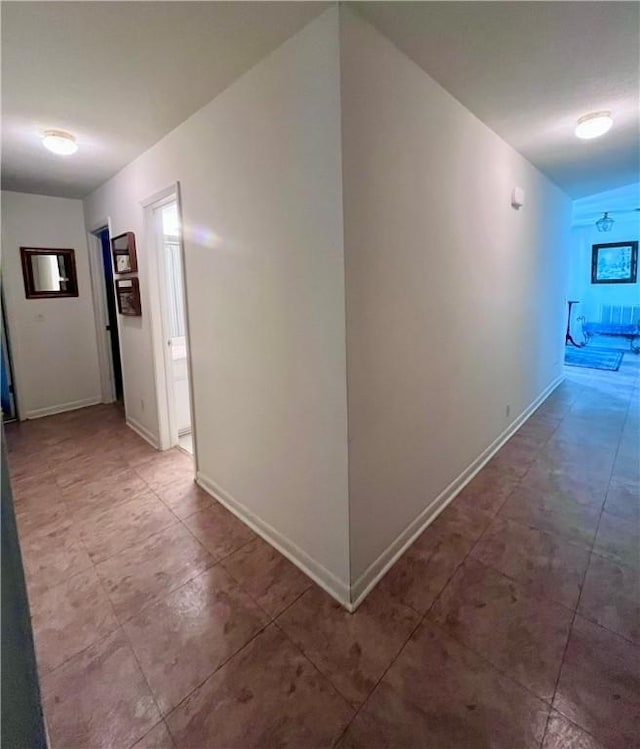 119 Saint Clair Dr, Saint Simons Island, GA 31522 - hallway with baseboards and tile patterned floors