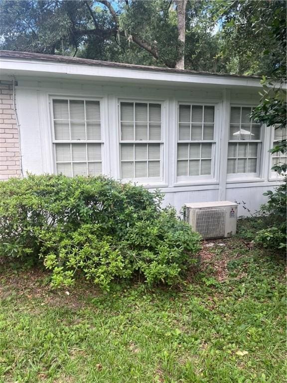 119 Saint Clair Dr, Saint Simons Island, GA 31522 - view of property exterior featuring brick siding