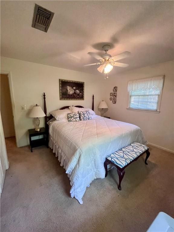 119 Saint Clair Dr, Saint Simons Island, GA 31522 - bedroom with carpet flooring and a ceiling fan