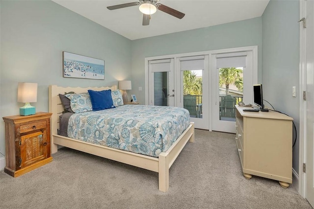 bedroom with ceiling fan, access to exterior, french doors, and light carpet