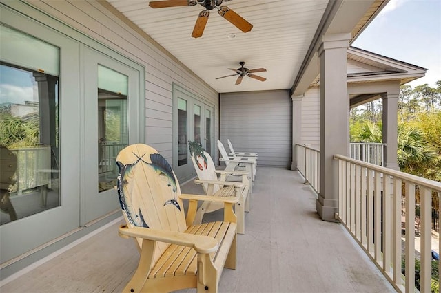 balcony featuring a ceiling fan and french doors