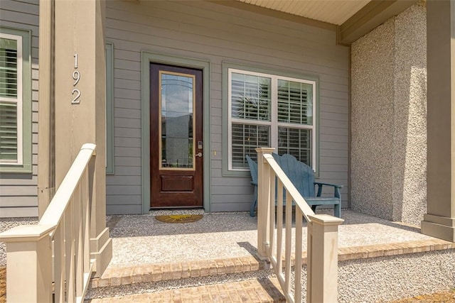 entrance to property with covered porch