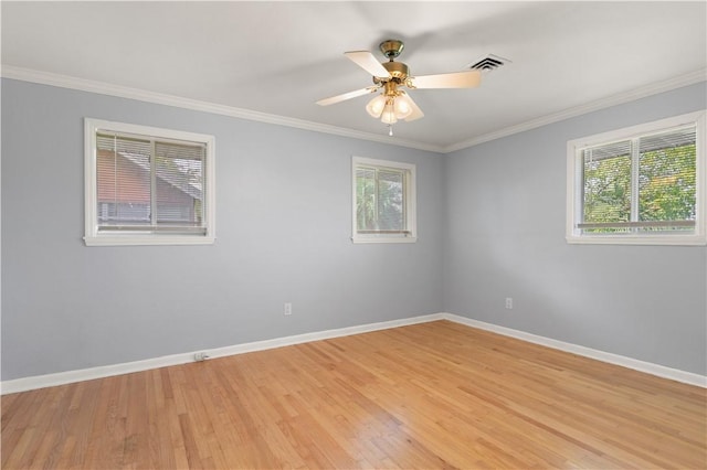 1207 Lanier Blvd, Brunswick, GA 31520 - spare room featuring light hardwood / wood-style floors, ceiling fan, and ornamental molding