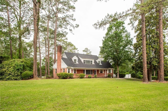 1701 Satilla Blvd, Waycross, GA 31501 - new england style home with a chimney and a front lawn