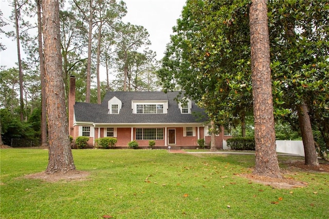 1701 Satilla Blvd, Waycross, GA 31501 - cape cod-style house with brick siding and a chimney