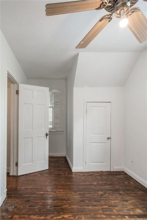 1701 Satilla Blvd, Waycross, GA 31501 - unfurnished bedroom with baseboards, wood finished floors, a ceiling fan, and vaulted ceiling