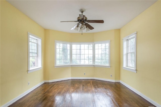 1701 Satilla Blvd, Waycross, GA 31501 - empty room with dark wood-type flooring, ceiling fan, and baseboards