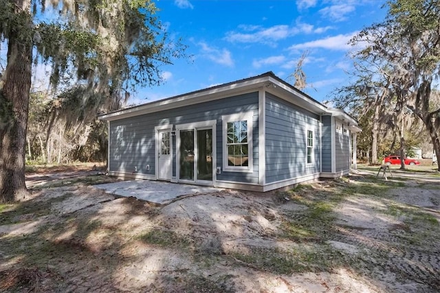 rear view of house featuring a patio area