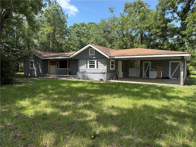 4427 Pine Valley Rd, Waycross, GA 31503 - rear view of house featuring a yard and a carport