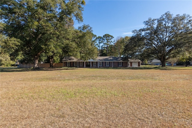 view of yard with a garage