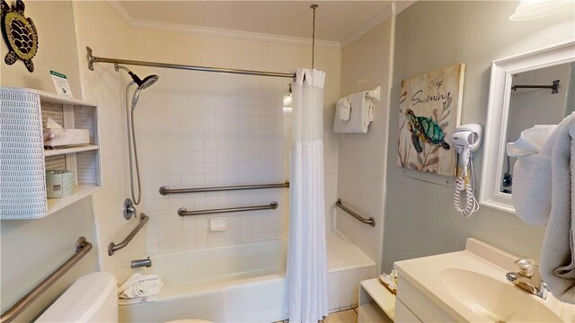 full bathroom with vanity, crown molding, shower / bathtub combination with curtain, and toilet