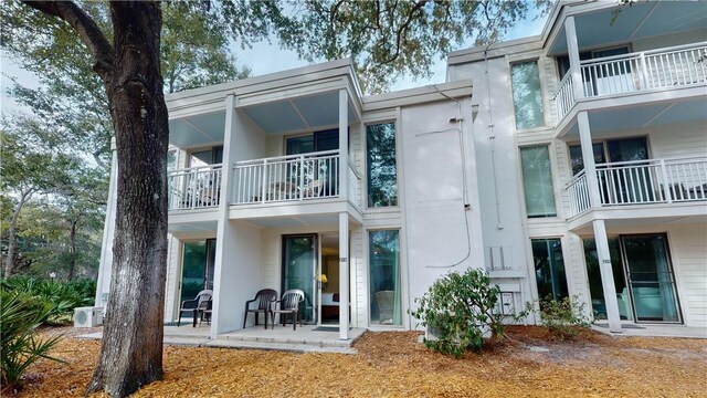 back of house featuring a patio