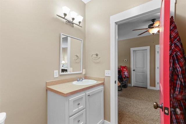 bathroom featuring vanity and ceiling fan