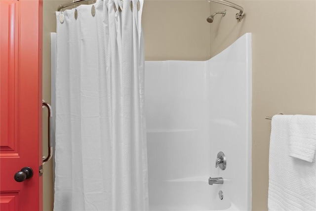 bathroom featuring shower / bath combination with curtain
