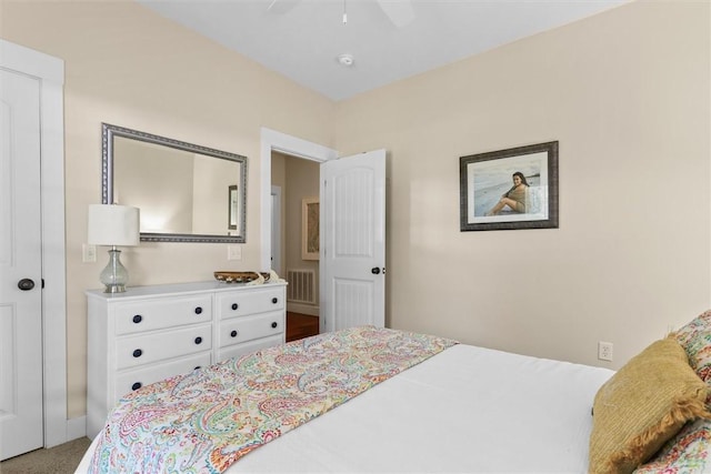 bedroom with a ceiling fan and visible vents