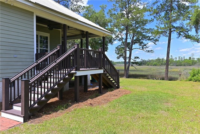 1261 Otter Slide Loop, Townsend, GA 31331 - view of green lawn featuring stairway and ceiling fan