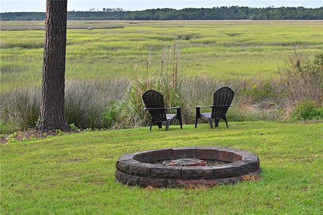 1261 Otter Slide Loop, Townsend, GA 31331 - view of yard featuring an outdoor fire pit and a view of countryside