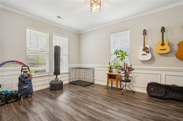 140 Clearwater Dr, Brunswick, GA 31523 - rec room featuring ornamental molding, visible vents, wood finished floors, and plenty of natural light