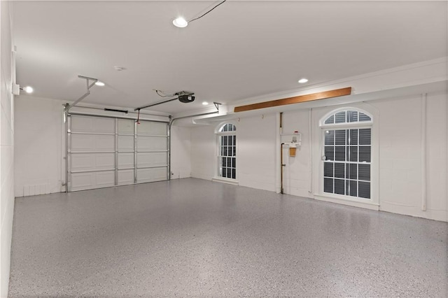 garage featuring a garage door opener