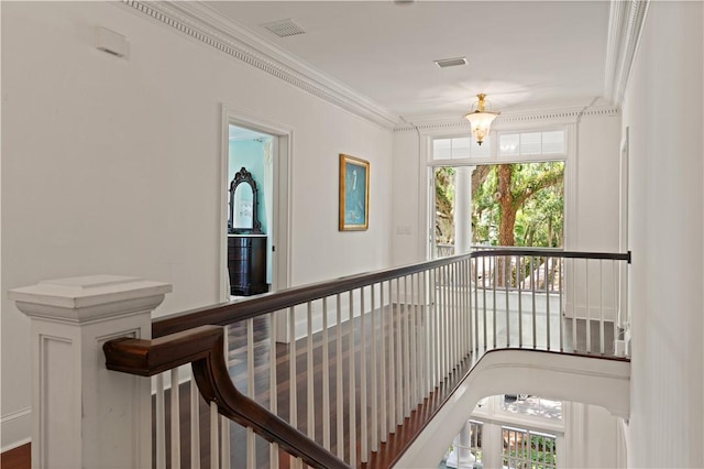 corridor featuring ornamental molding