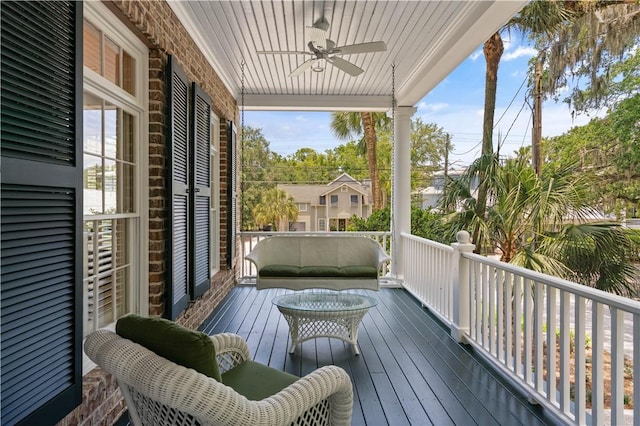 exterior space with ceiling fan and covered porch