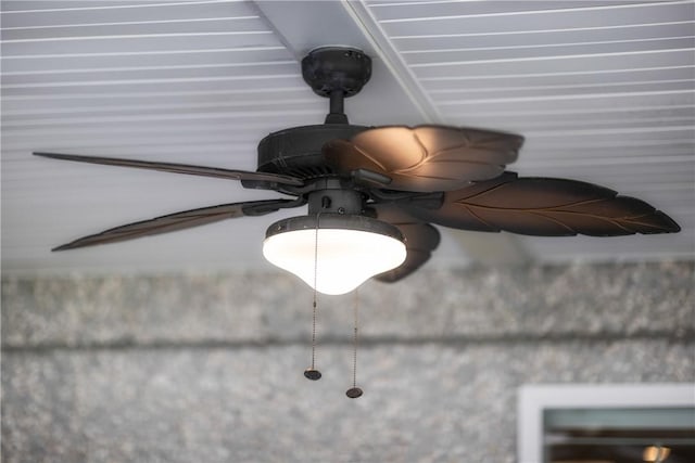interior details featuring a ceiling fan
