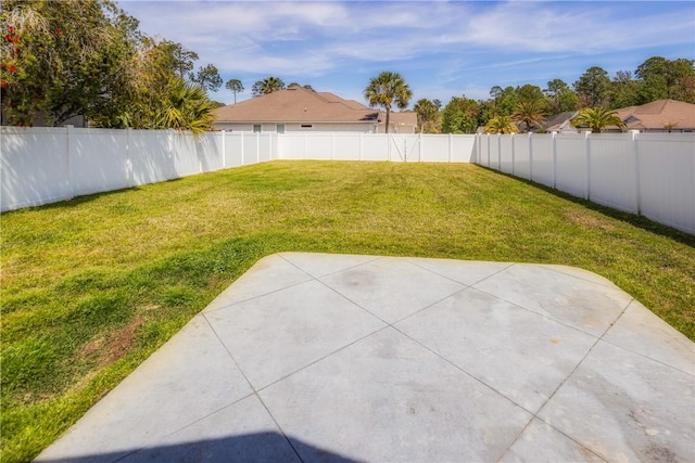 view of yard with a patio and a fenced backyard