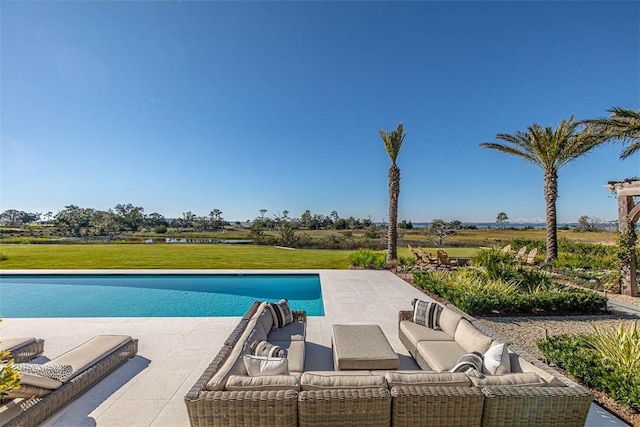 view of swimming pool featuring a patio and outdoor lounge area