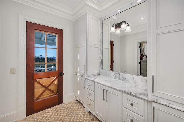 bathroom with vanity and crown molding