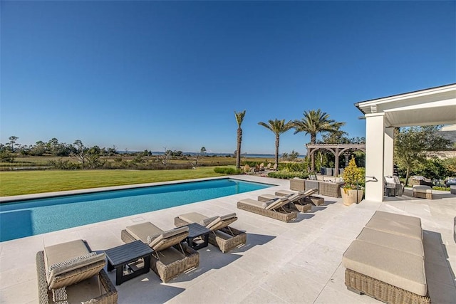 view of swimming pool featuring a patio