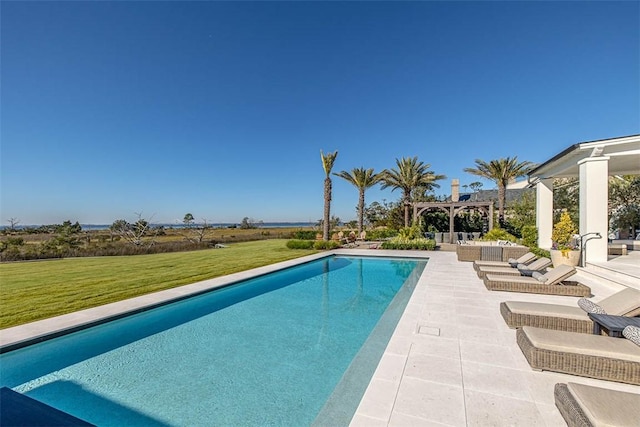 view of pool featuring a patio, a yard, and a pergola