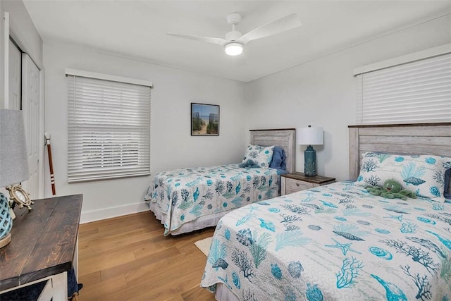 bedroom featuring ceiling fan and light wood-type flooring