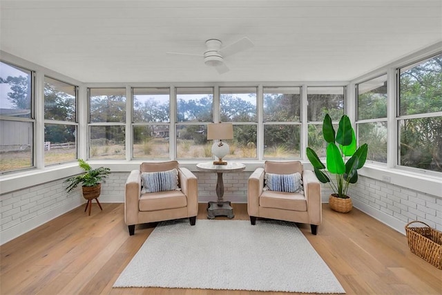 sunroom / solarium with ceiling fan