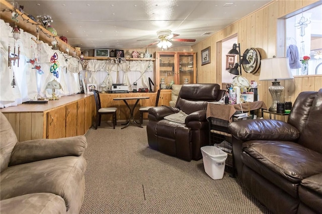 2896 S Lakeview Dr, Waycross, GA 31503 - living room with carpet, ceiling fan, and wooden walls