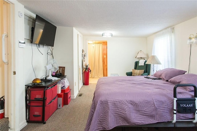 2896 S Lakeview Dr, Waycross, GA 31503 - carpeted bedroom with a textured ceiling