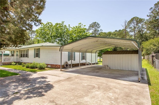 2896 S Lakeview Dr, Waycross, GA 31503 - view of parking featuring driveway and a carport