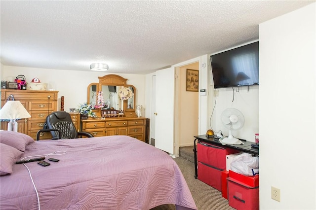 2896 S Lakeview Dr, Waycross, GA 31503 - carpeted bedroom featuring a textured ceiling