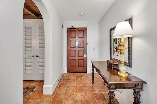 10 Dune Avenue (17, Room 142, 142P), Sea Island, GA 31561 - foyer entrance with beam ceiling, baseboards, and arched walkways