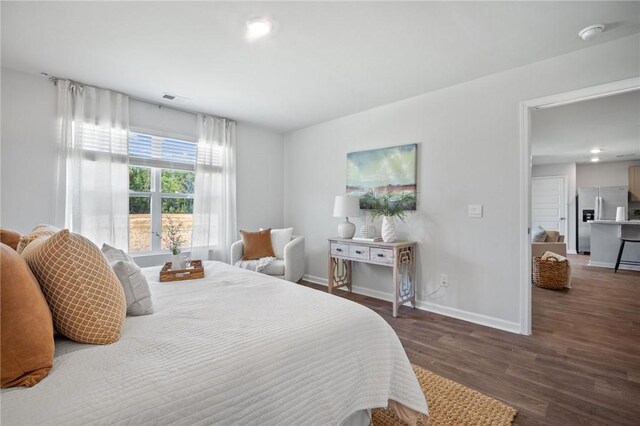331 Elizabeth Dr, Brunswick, GA 31525 - bedroom with stainless steel fridge with ice dispenser, wood finished floors, baseboards, and recessed lighting