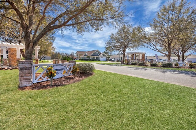 331 Elizabeth Dr, Brunswick, GA 31525 - community sign featuring a yard and a residential view