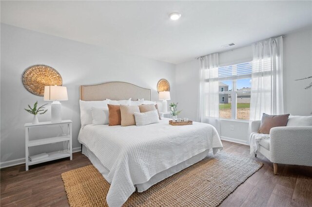 331 Elizabeth Dr, Brunswick, GA 31525 - bedroom featuring wood finished floors and baseboards