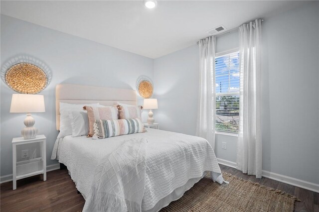 331 Elizabeth Dr, Brunswick, GA 31525 - bedroom with wood finished floors and baseboards