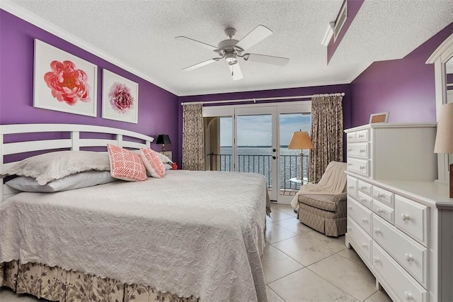 bedroom with french doors, light tile patterned floors, ceiling fan, a textured ceiling, and access to outside